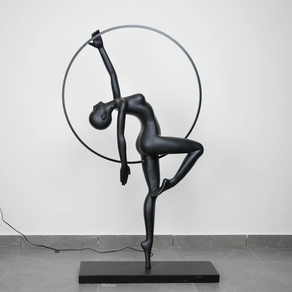 Matte black human form floor lamp with LED halo ring modern luxury ambient lighting decor