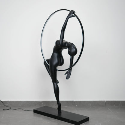Matte black human form floor lamp with LED halo ring modern luxury ambient lighting decor