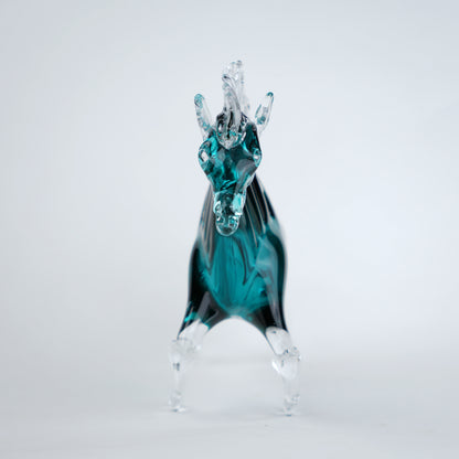 Aqua teal glass horse figurine with clear glass body and textured mane detail