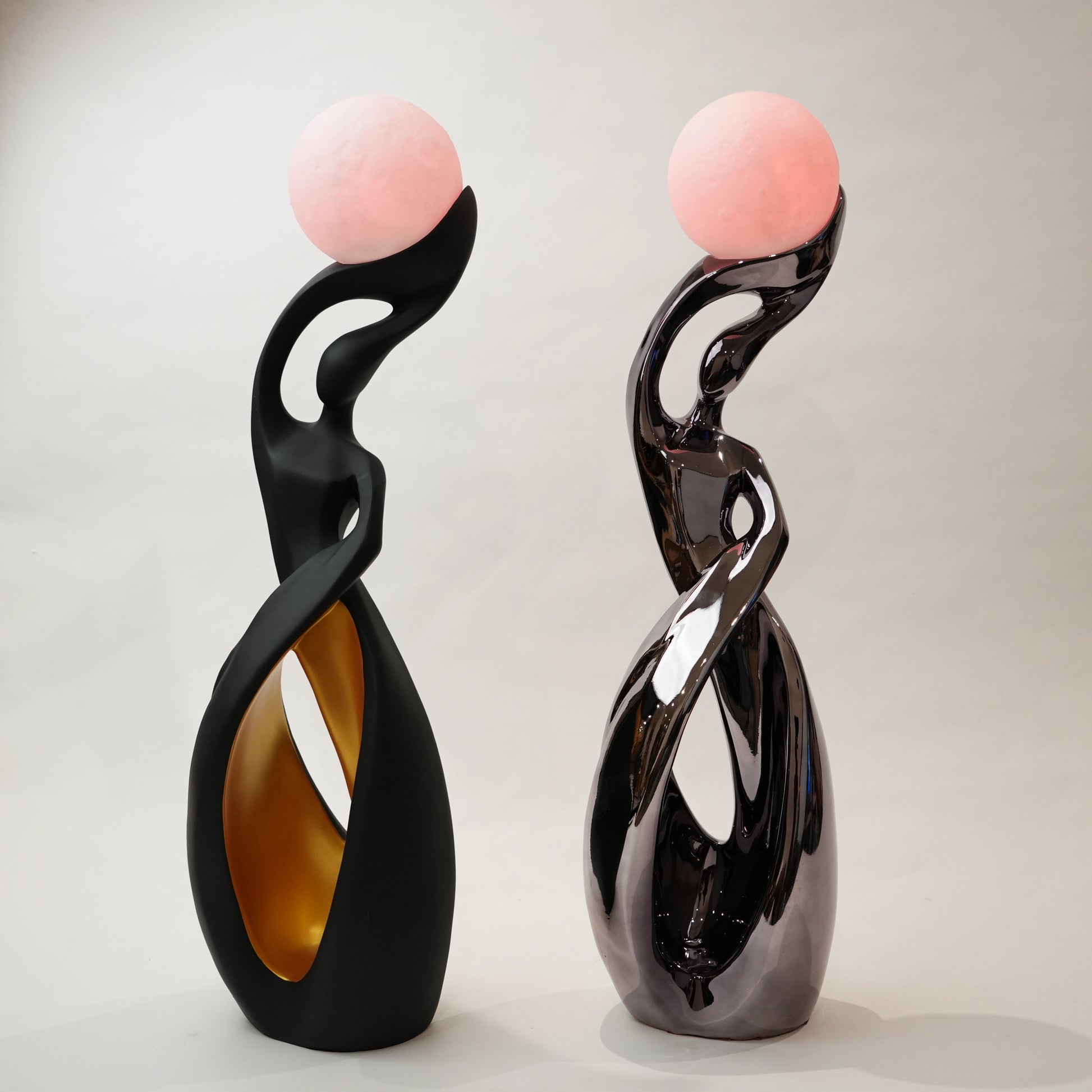 modern sculptural table lamp with glowing orb ambient lighting