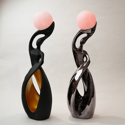 modern sculptural table lamp with glowing orb ambient lighting