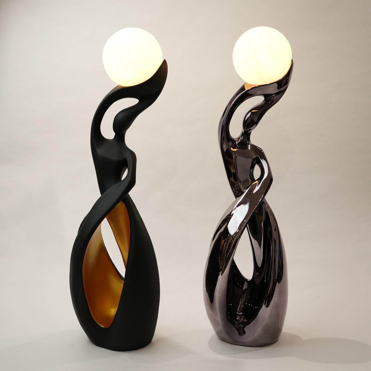 modern sculptural table lamp with glowing orb ambient lighting
