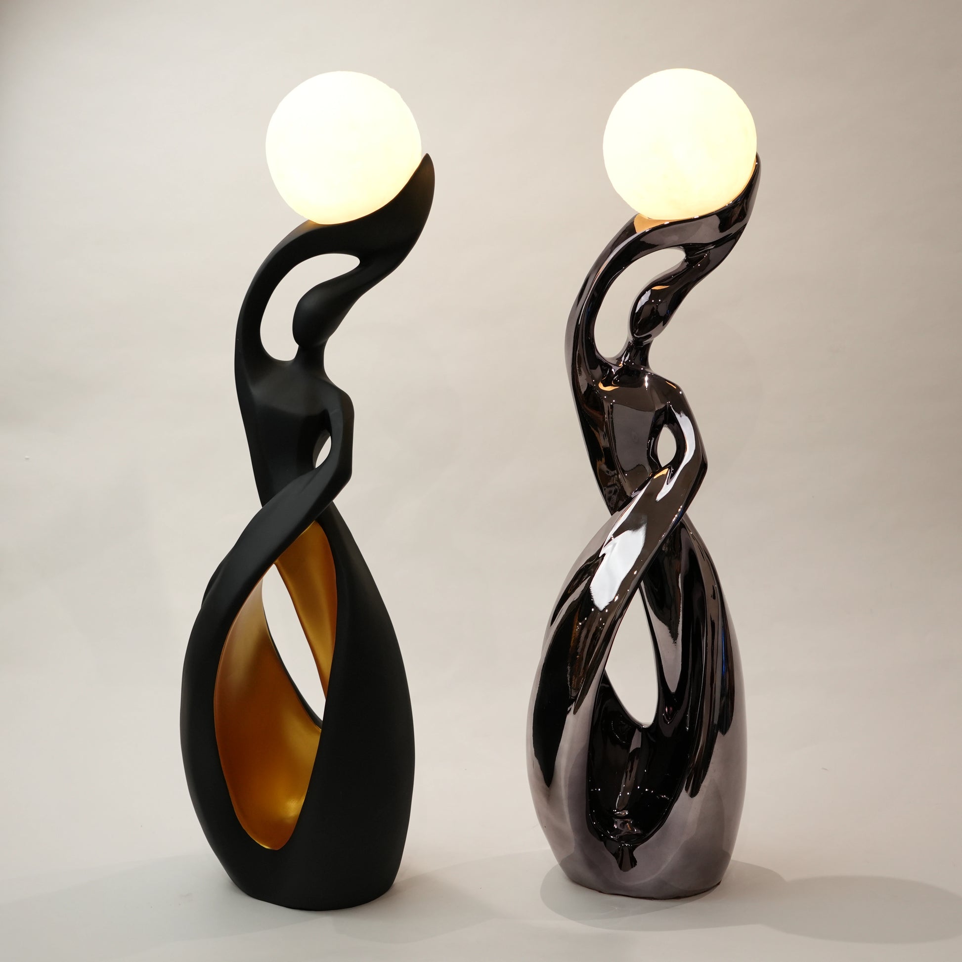 modern sculptural table lamp with glowing orb ambient lighting