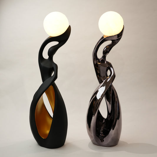 modern sculptural table lamp with glowing orb ambient lighting