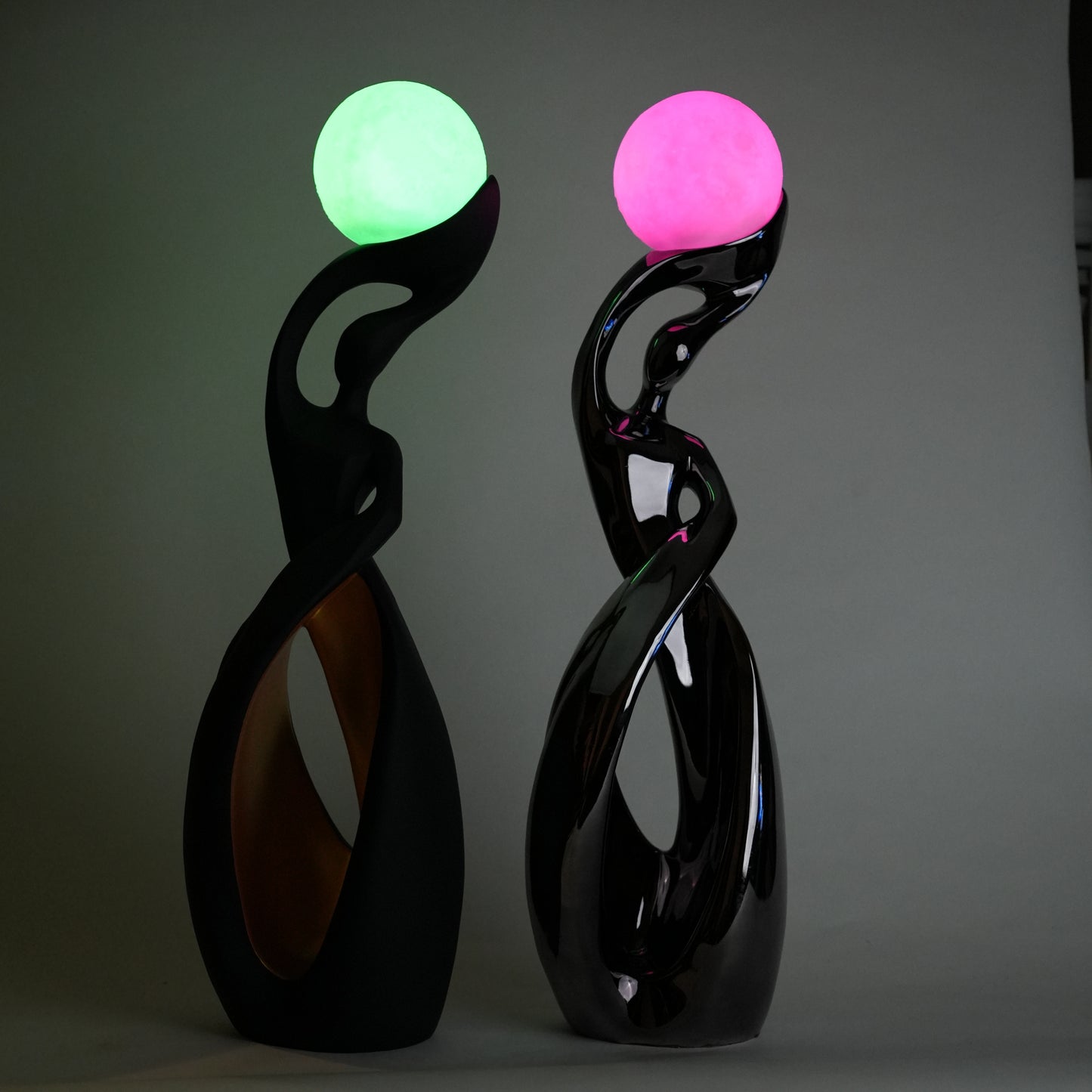 modern sculptural table lamp with glowing orb ambient lighting