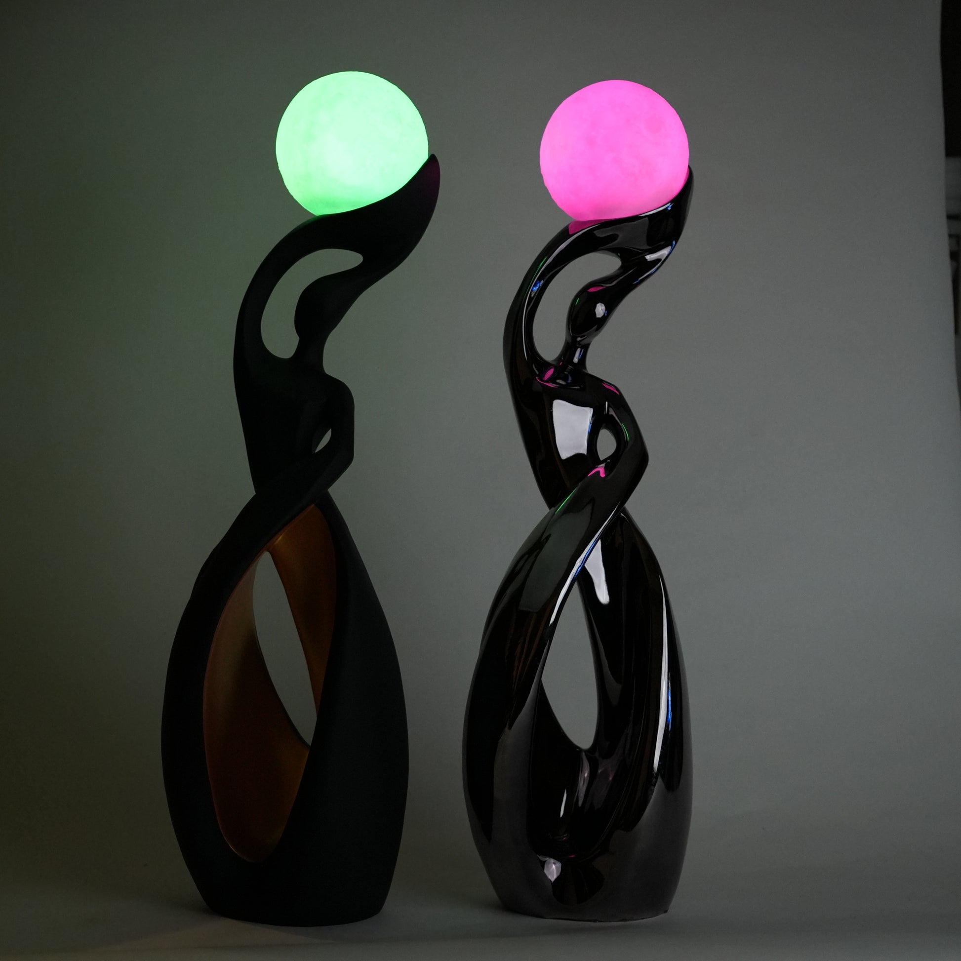 modern sculptural table lamp with glowing orb ambient lighting