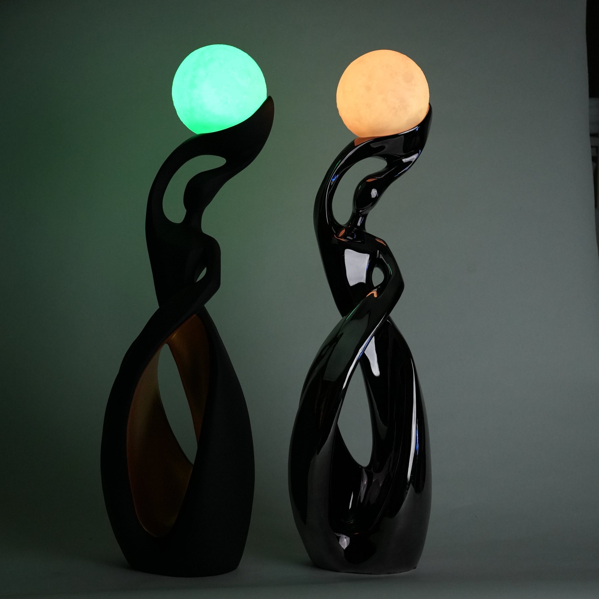 modern sculptural table lamp with glowing orb ambient lighting