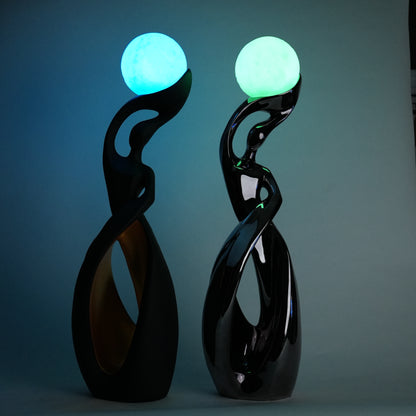 modern sculptural table lamp with glowing orb ambient lighting
