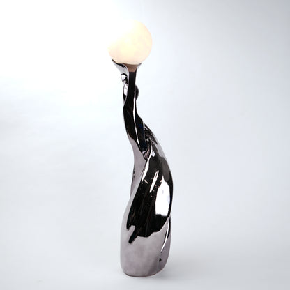 modern sculptural table lamp with glowing orb ambient lighting
