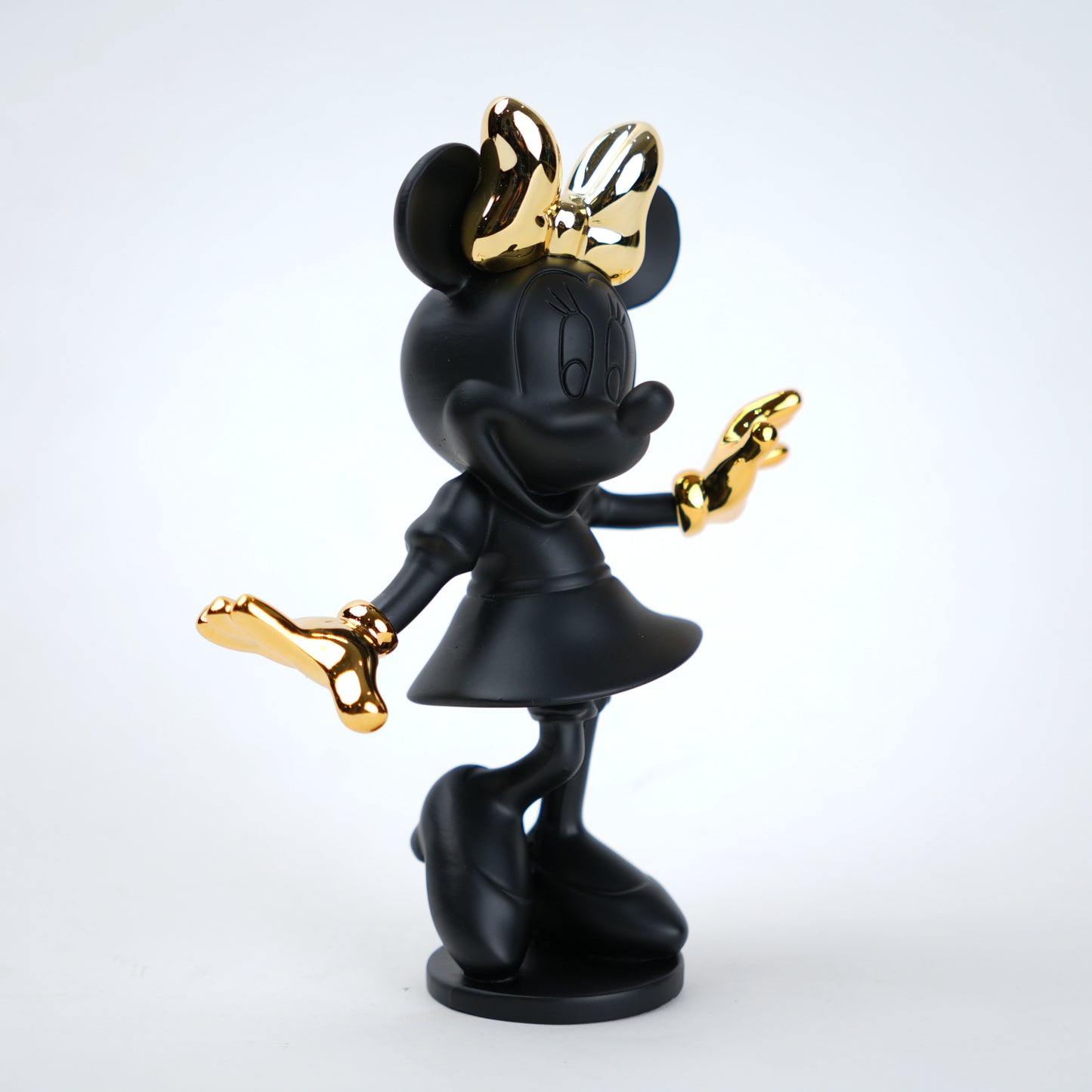 black gold character sculpture decor