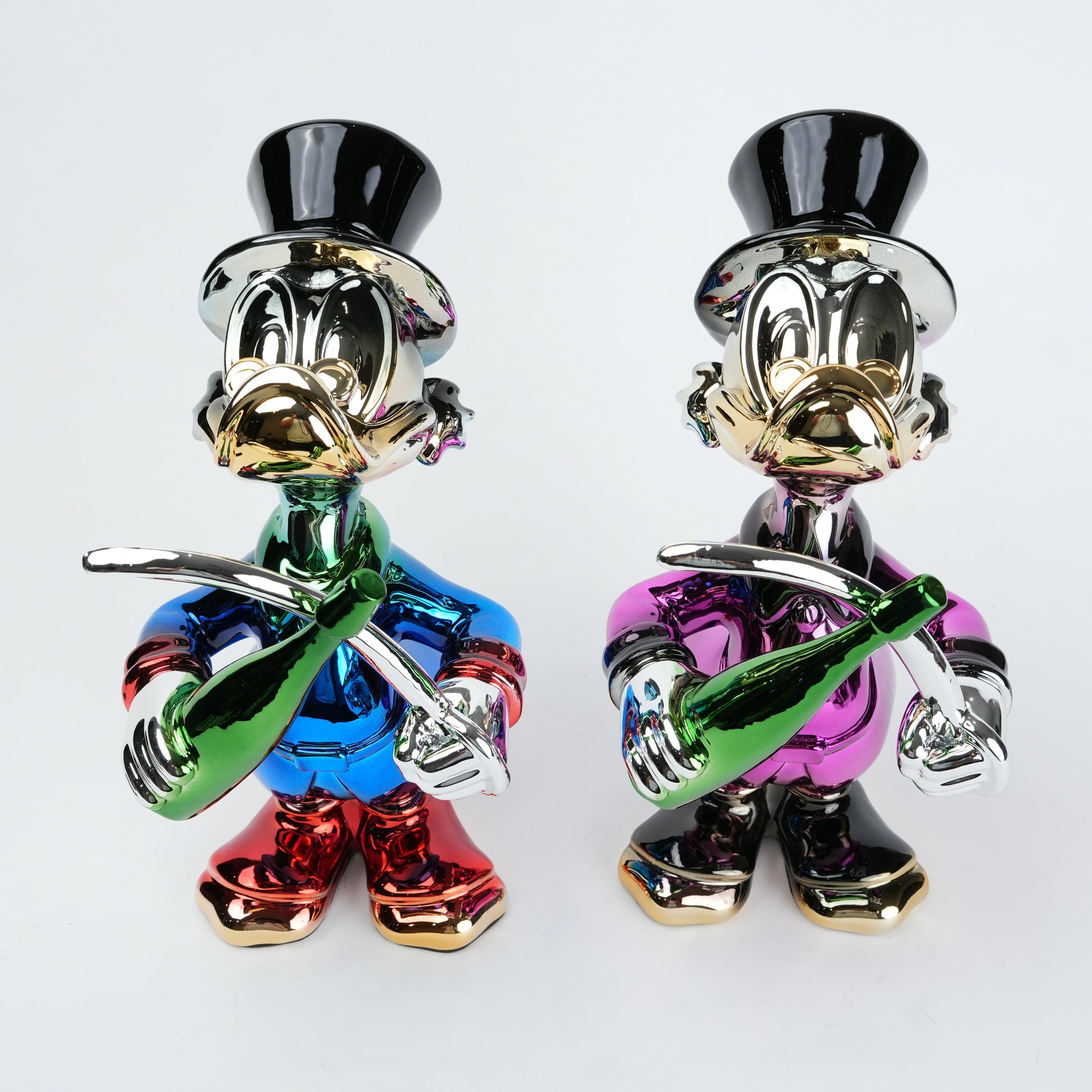 pink duck figurine holding champagne bottle and sword chrome finish luxury home decor accent