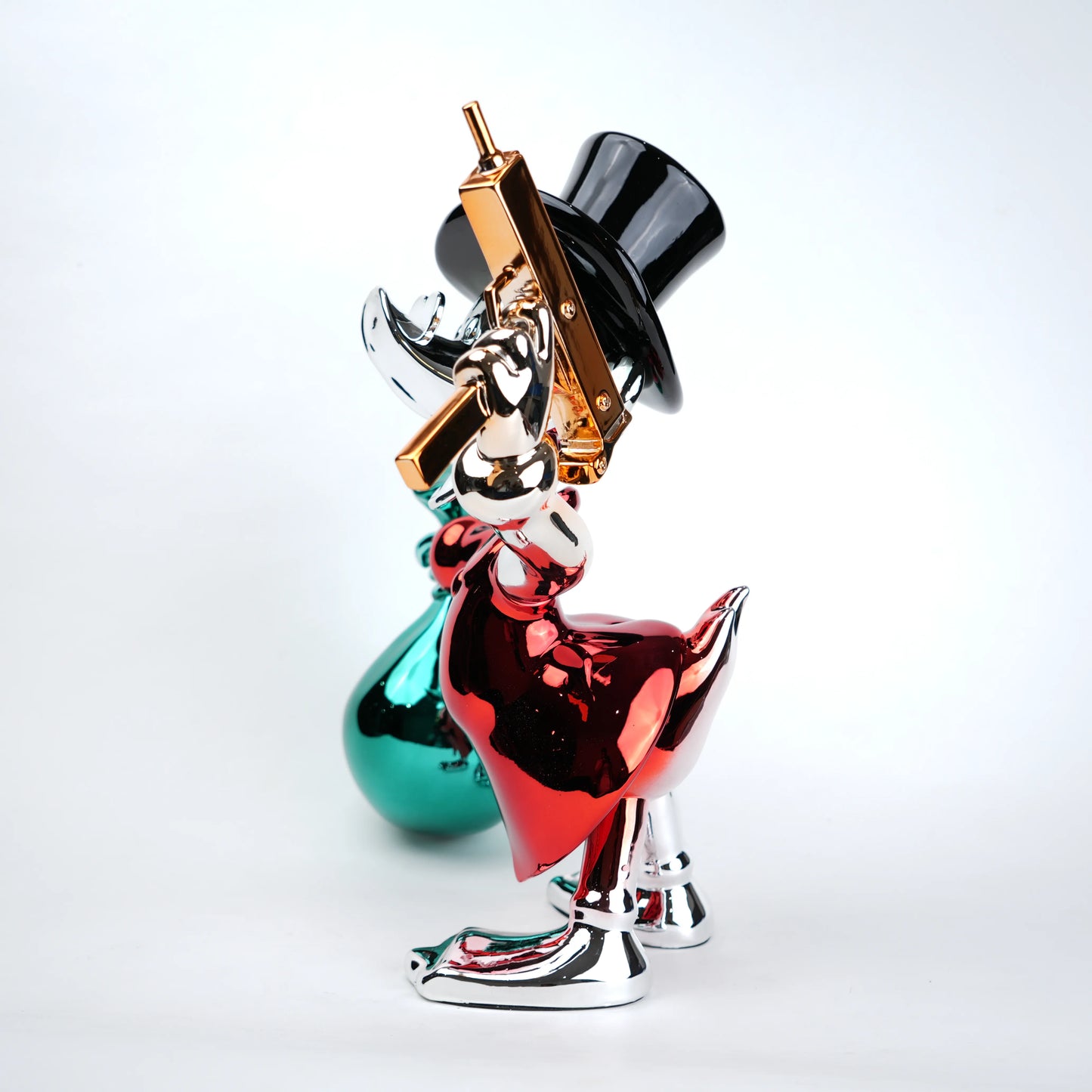 Colorful glass sculpture of a figure with a top hat and cane on a white background