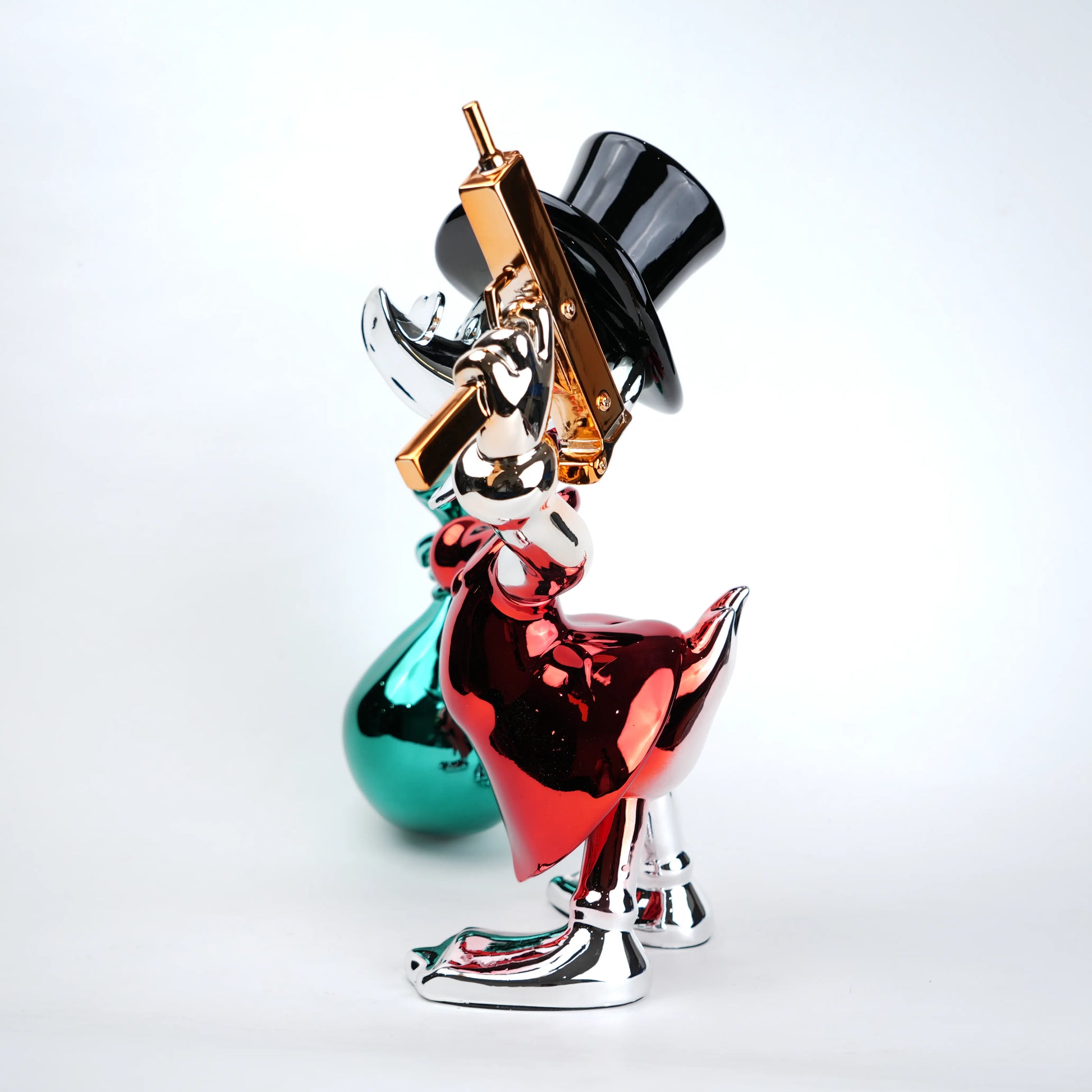 Colorful glass sculpture of a figure with a top hat and cane on a white background