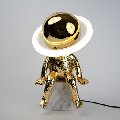 Cosmic Glow Table Lamp styled in modern decor setting