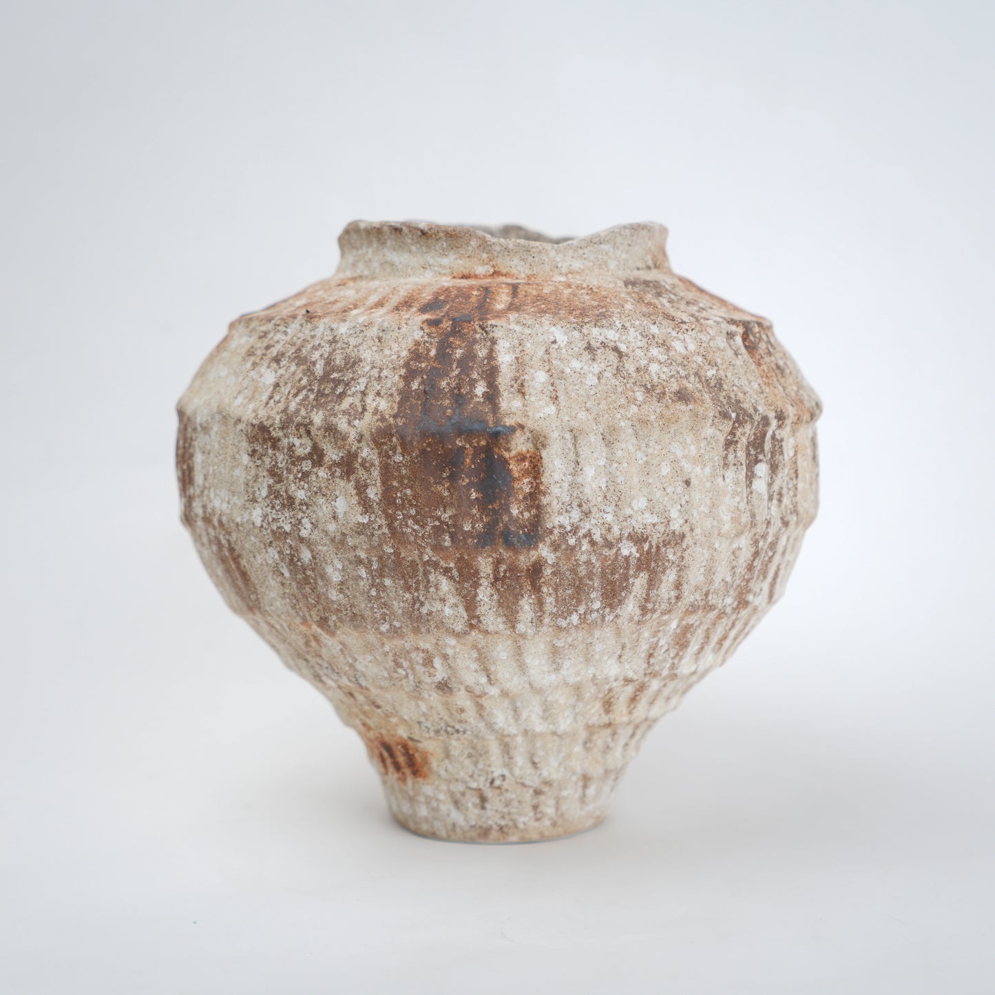Rust patina ceramic vase with textured earthy finish available in small and large sizes for home decor