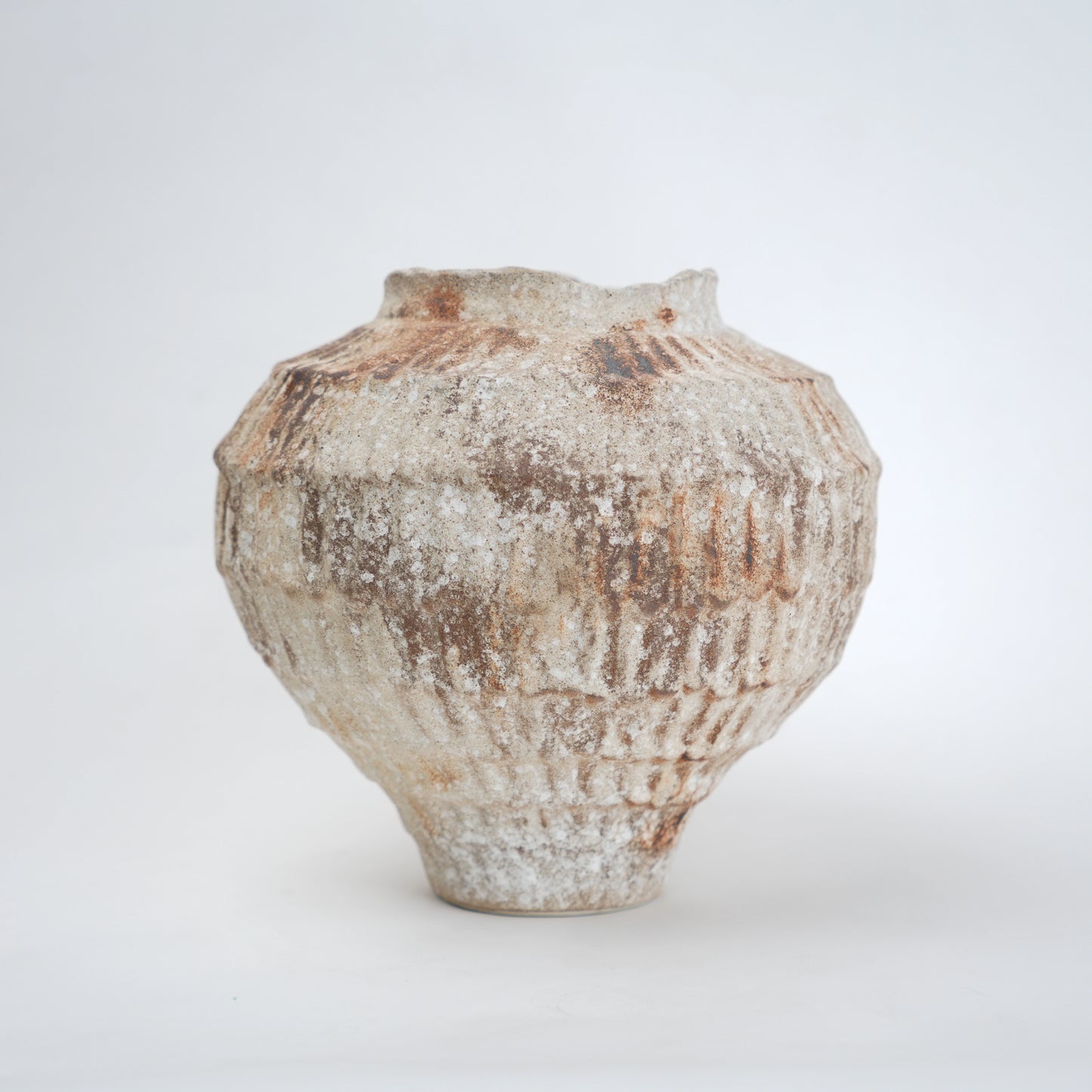 Rust patina ceramic vase with textured earthy finish available in small and large sizes for home decor