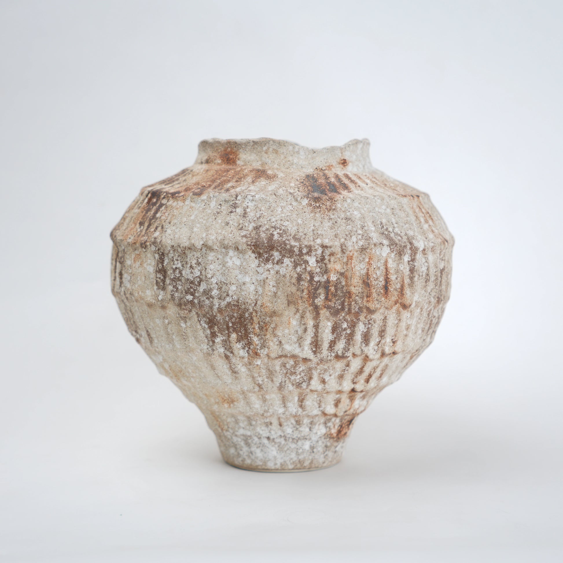 Rust patina ceramic vase with textured earthy finish available in small and large sizes for home decor