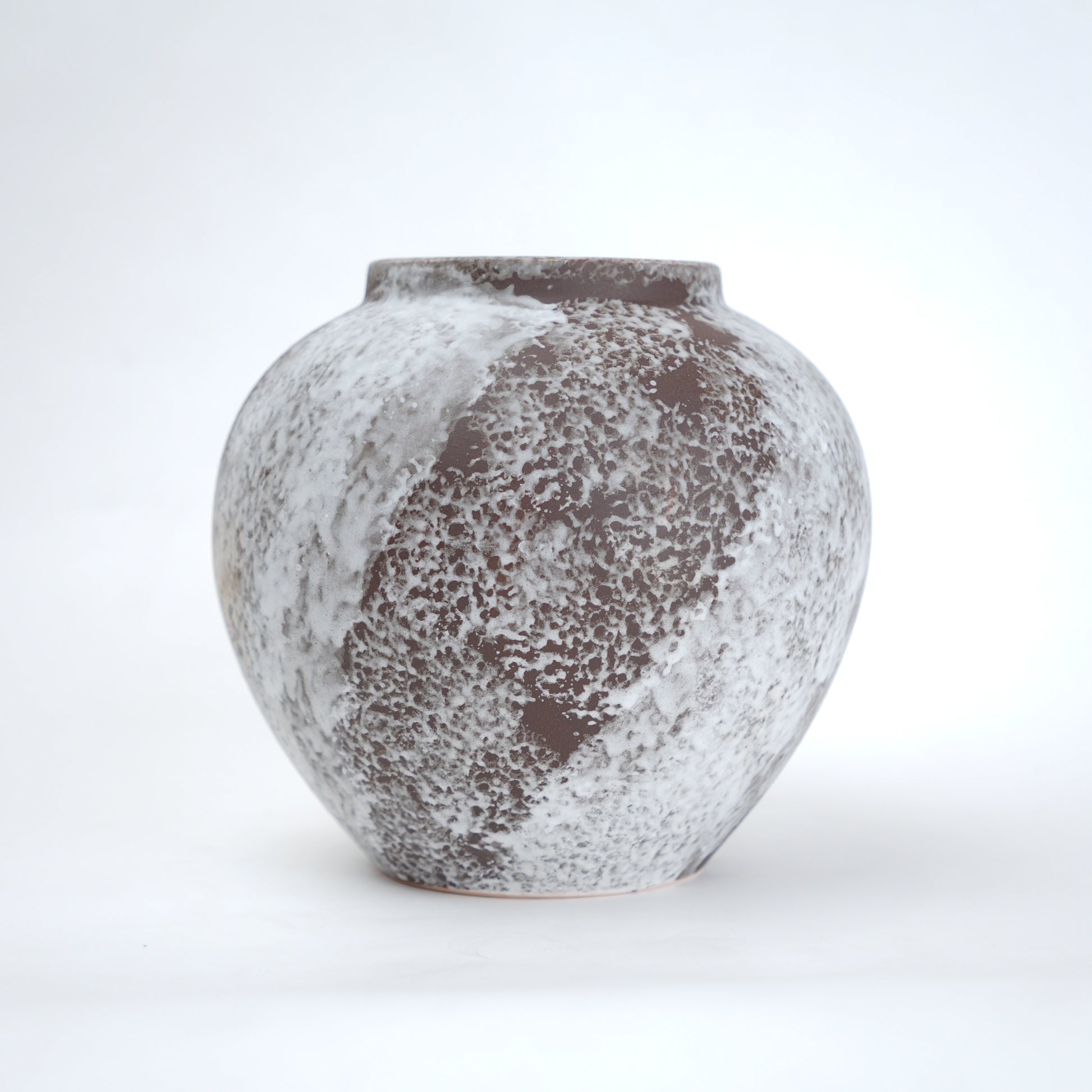 Mineral glaze ceramic vase in brown and white textured finish available in small medium and large sizes