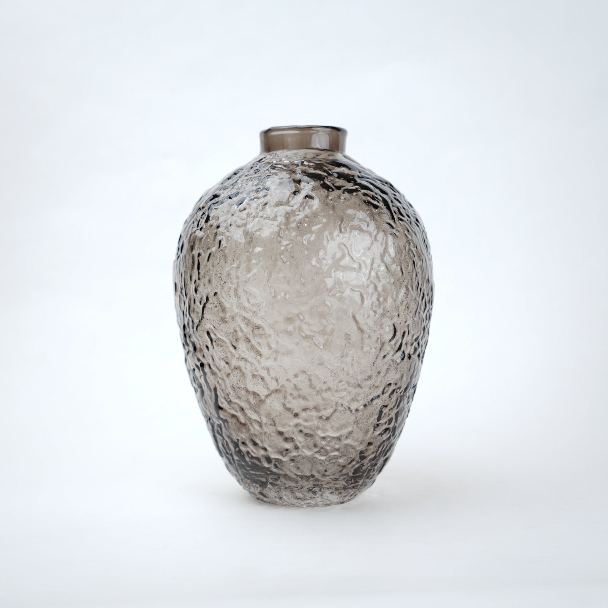 Hammered glass vase in warm grey finish available in three sizes for modern home decor styling