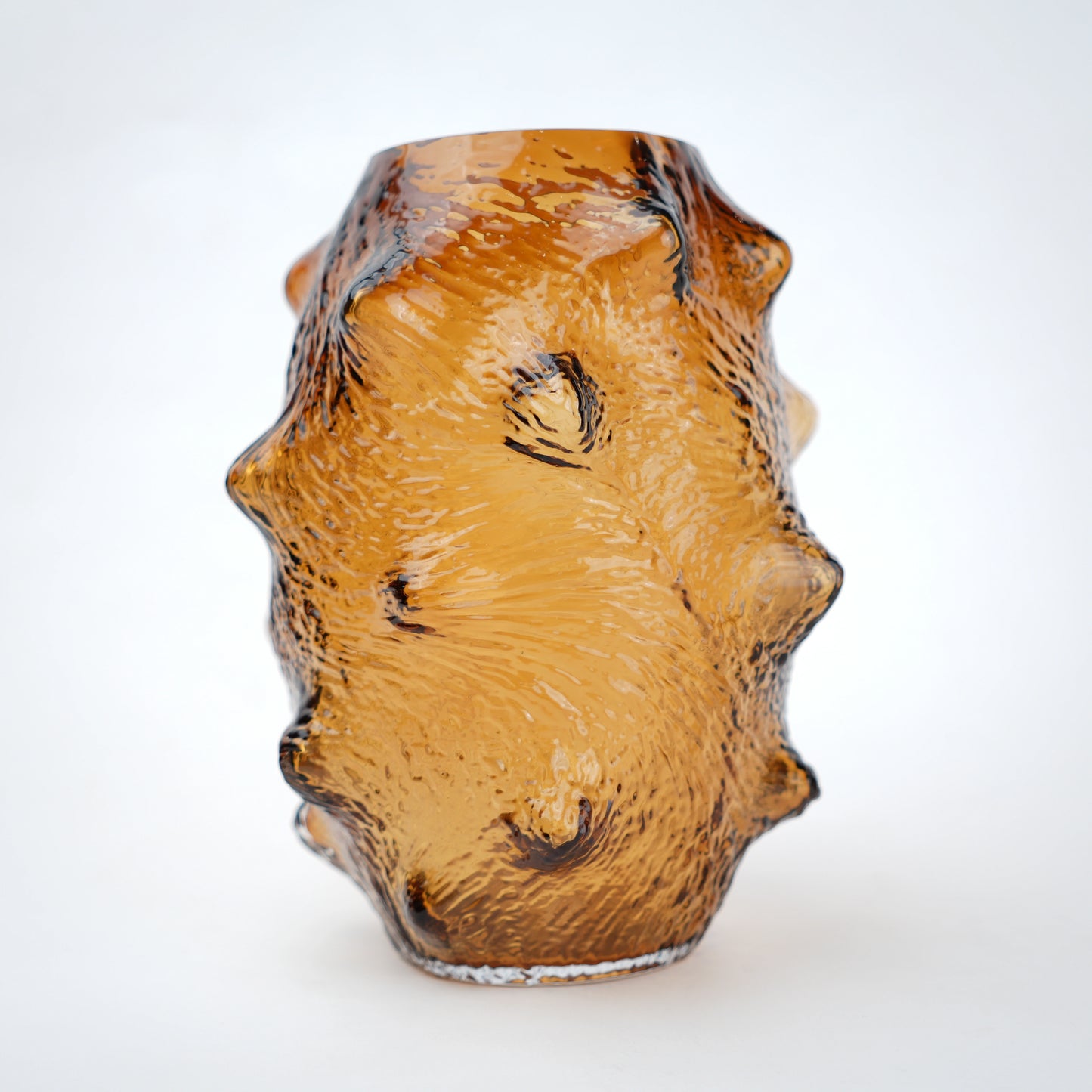 Small amber hammered vase, side angle