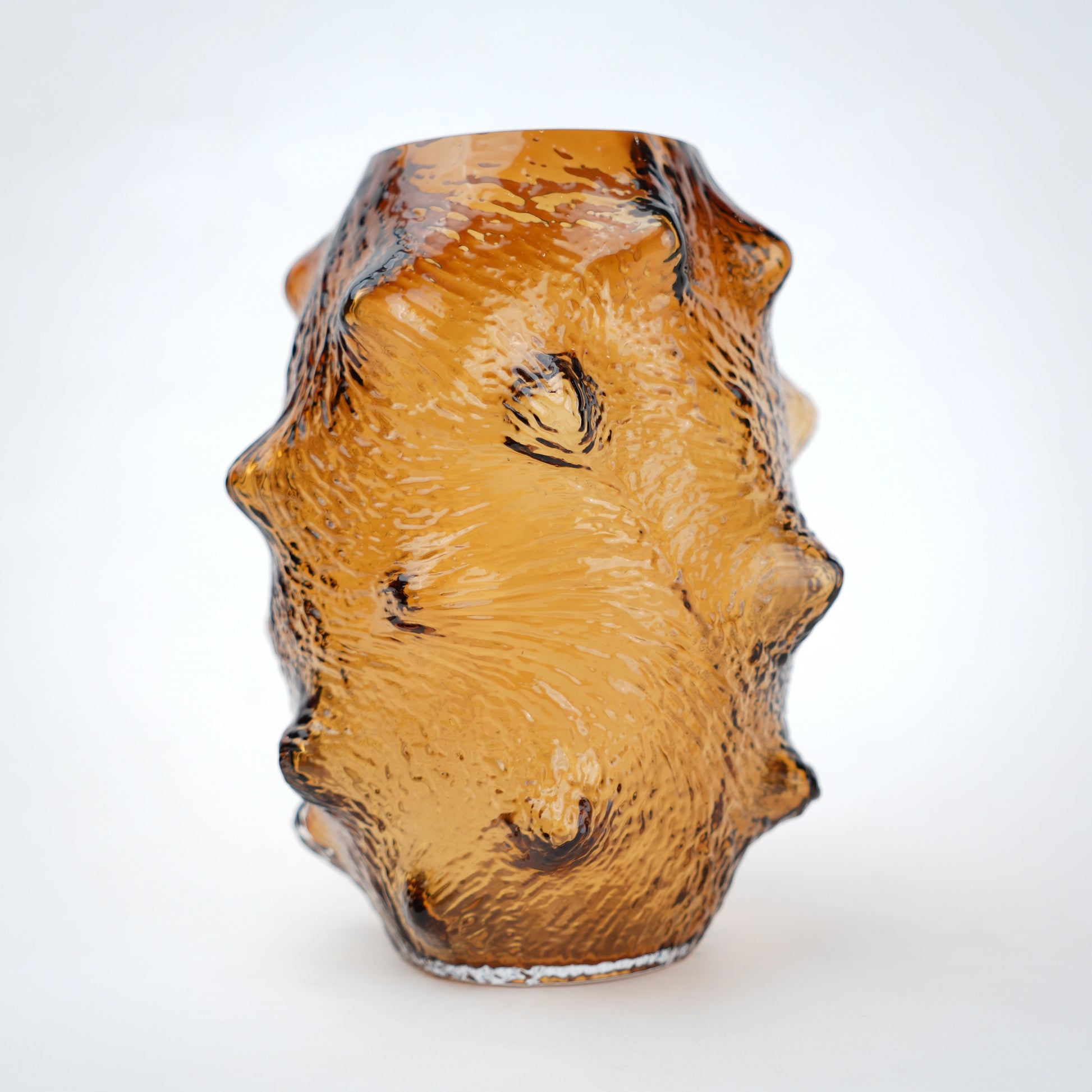 Small amber hammered vase, side angle