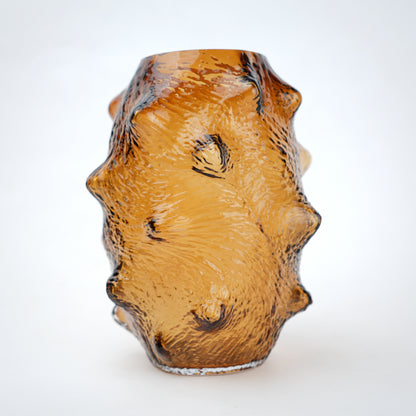 Small amber hammered vase, side angle