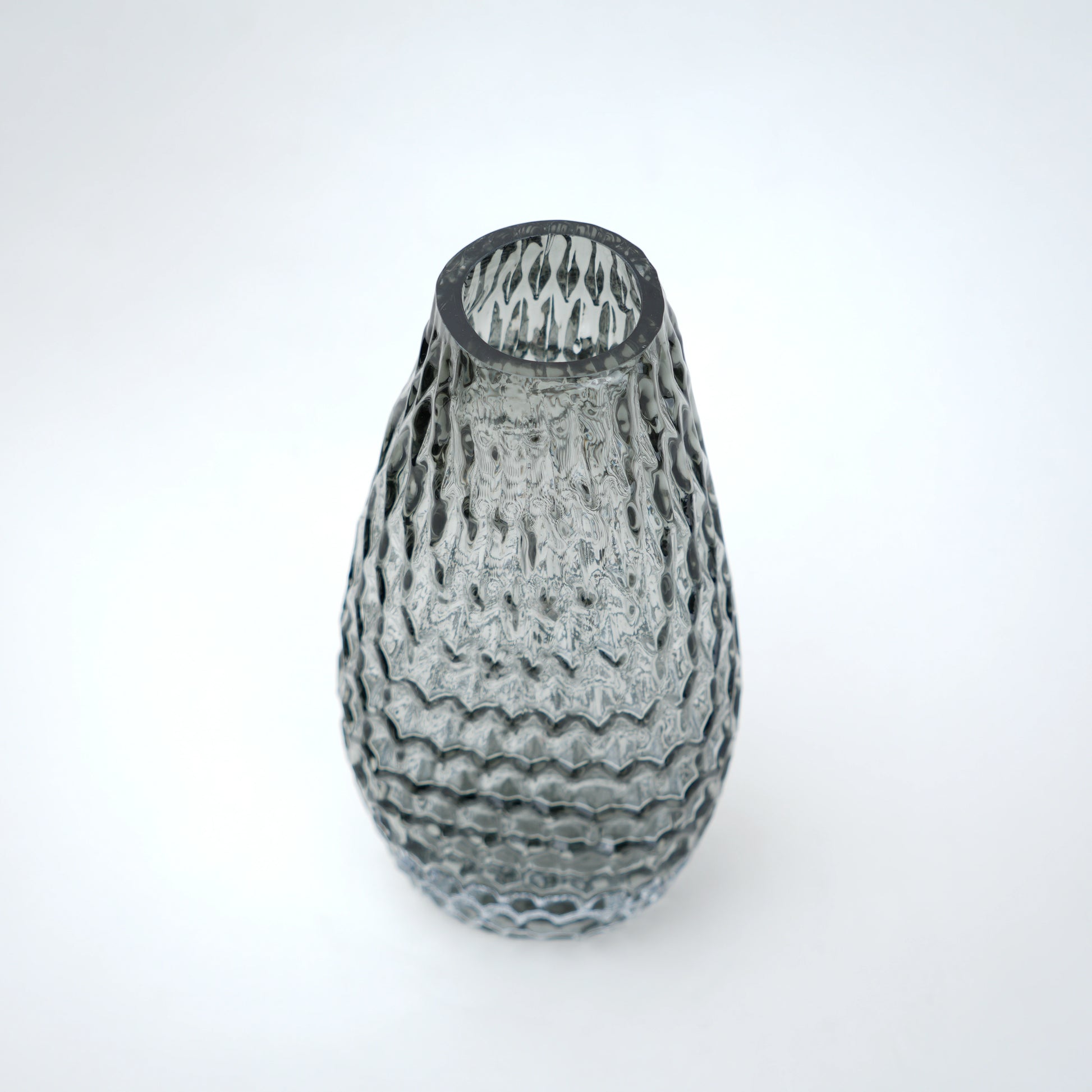 Decorative glass vase with textured design