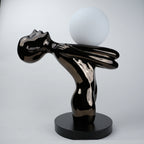 black sculptural table lamp with frosted globe modern designer lighting decor