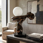 Black Sculptural Table Lamp with frosted globe light
