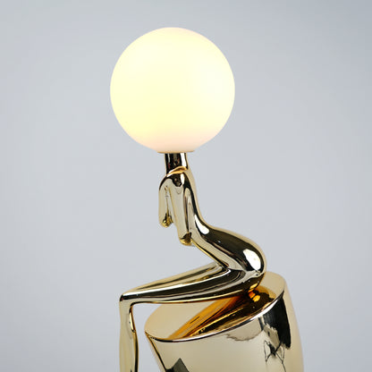 modern gold lamp with spherical light decor