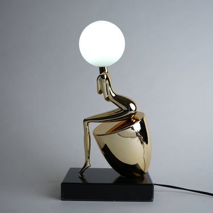 modern gold lamp with spherical light decor