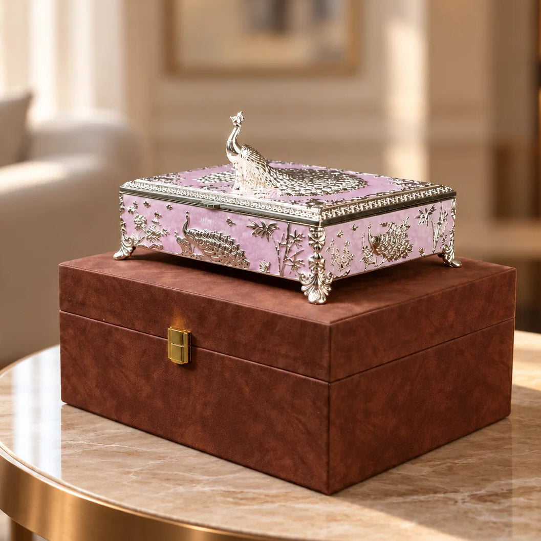 Royal peacock jewellery keepsake box with intricate silver floral and feather detailing