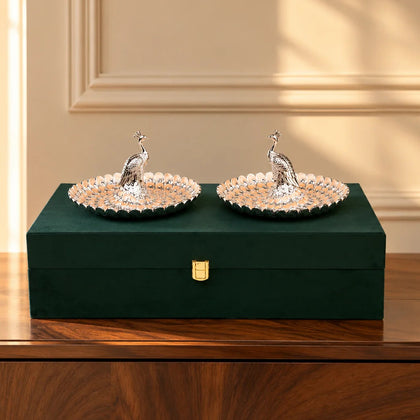 Royal peacock serving platter set with intricate feather detailing for festive table decor