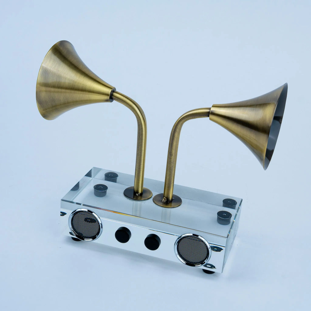 Brass tone horn speaker decor with twin circular front grilles