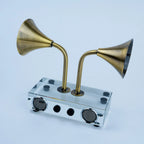 Brass tone horn speaker decor with twin circular front grilles