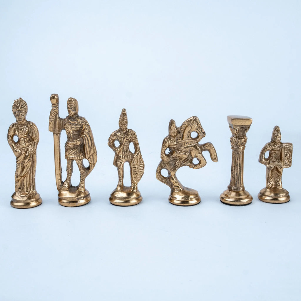 Royal-style chess set displayed on a marble coffee table in a luxury living room.