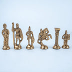 Royal-style chess set displayed on a marble coffee table in a luxury living room.