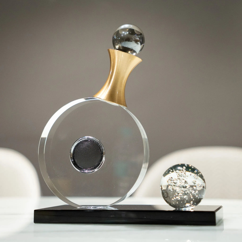 Contemporary guitar-inspired decorative art piece with reflective spherical details.
