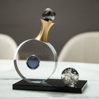 Contemporary decorative accent with circular geometry and a contrasting black base.