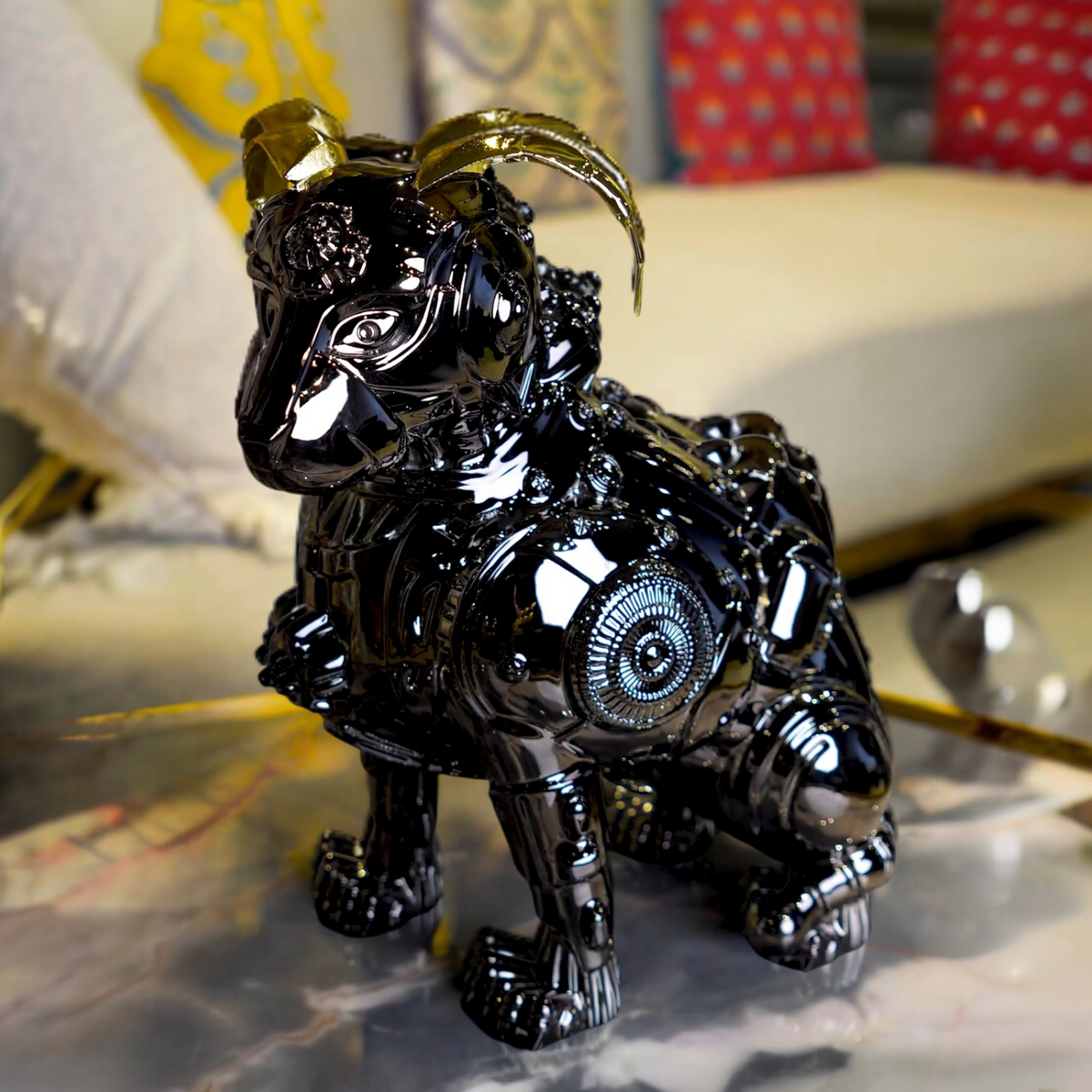 chrome black mechanical dog sculpture with gold accent ears