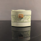 Sage green jewelry organizer box with ring holder and storage compartments