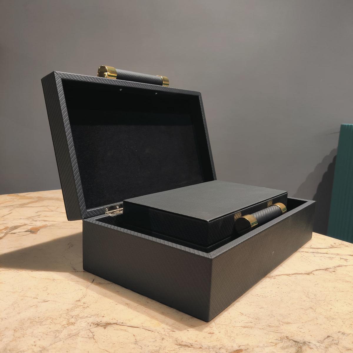 Modern leather jewelry organizer box featuring textured finish and sophisticated storage for watches, rings and valuables