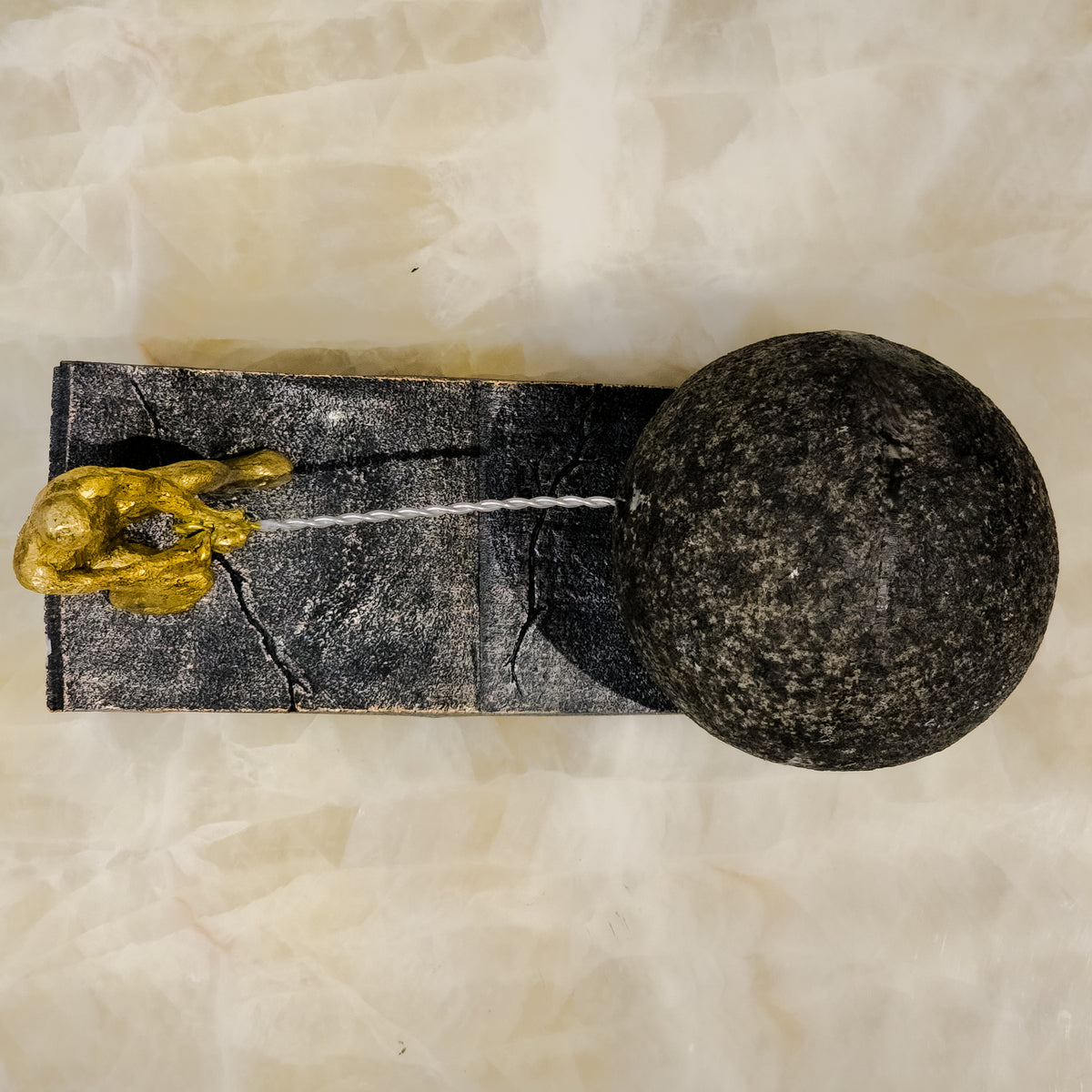 gold abstract human figure decor pulling sphere modern tabletop accent