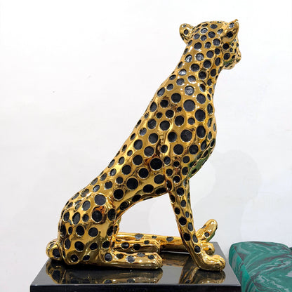 Decorative golden leopard sculpture with premium electroplated finish and seated posture