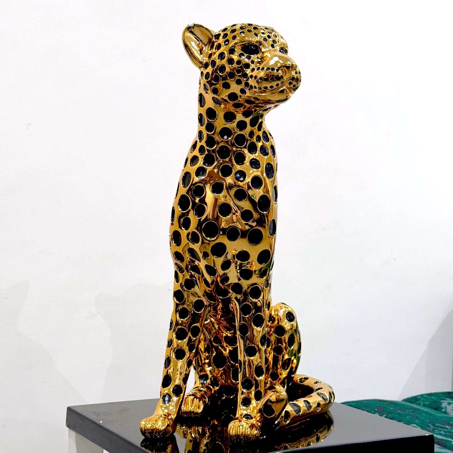 Decorative golden leopard sculpture with premium electroplated finish and seated posture