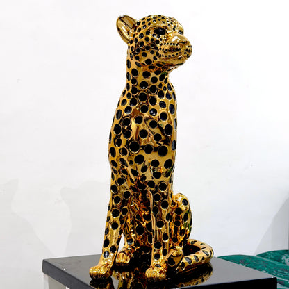 Decorative golden leopard sculpture with premium electroplated finish and seated posture