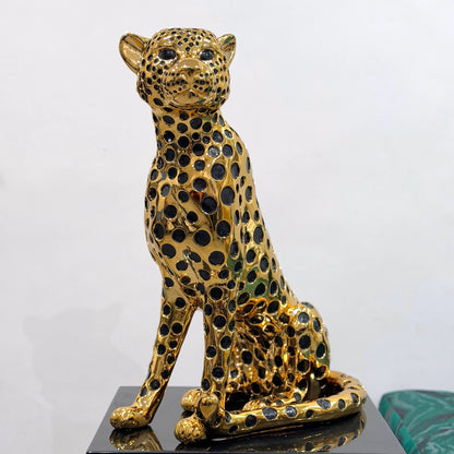 Modern luxury leopard figurine in gold and black for tabletop and console styling