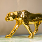 Modern gold panther decor piece for luxury home interiors