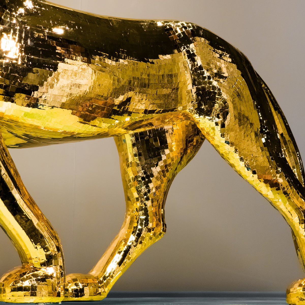 Modern gold panther decor piece for luxury home interiors