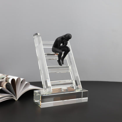 Reflective Heights ladder beside open book